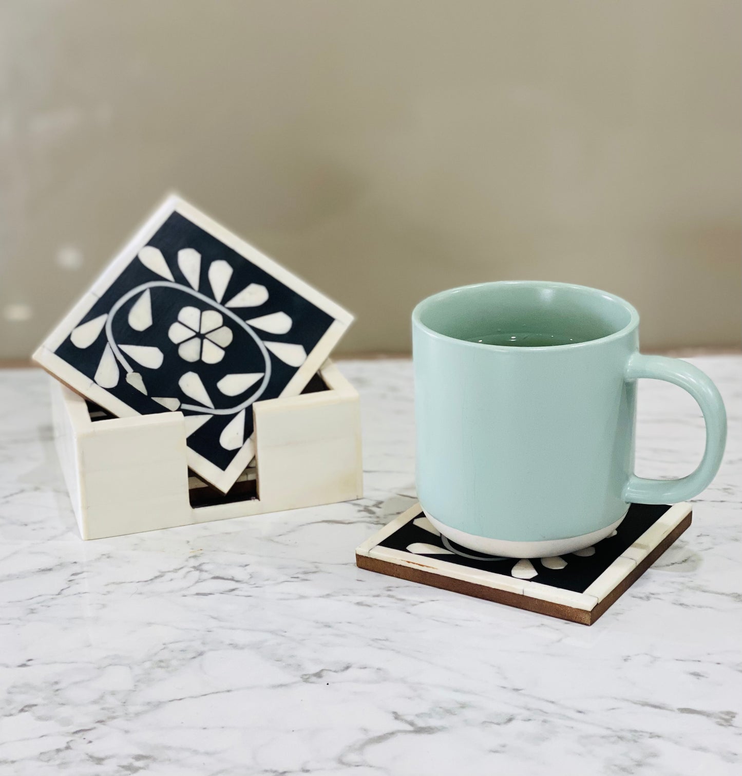 Coaster with holder